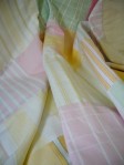 Close up of Patchwork in pink, yellow and green
