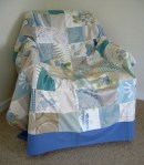 Blue Shabby Chic Style Patchwork Throw over Cane Chair