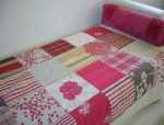 Pink Patchwork Throw on a Day Bed